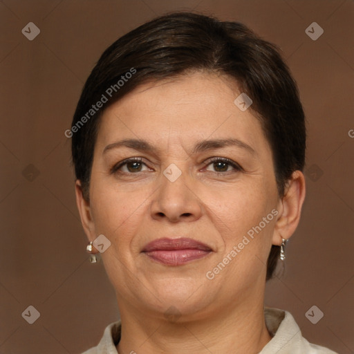 Joyful white adult female with short  brown hair and brown eyes