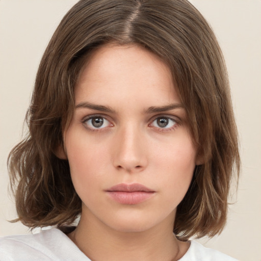 Neutral white young-adult female with medium  brown hair and brown eyes