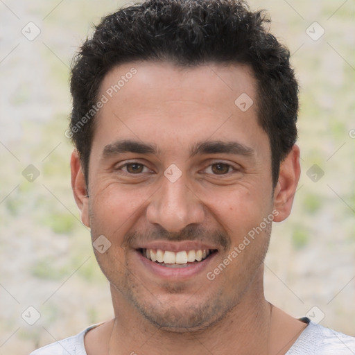 Joyful white young-adult male with short  black hair and brown eyes