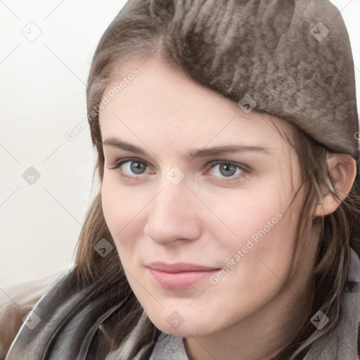 Neutral white young-adult female with medium  brown hair and grey eyes