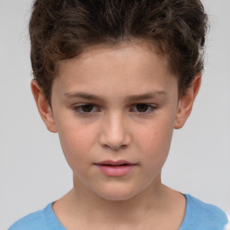 Neutral white child male with short  brown hair and brown eyes