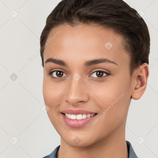 Joyful white young-adult female with short  brown hair and brown eyes