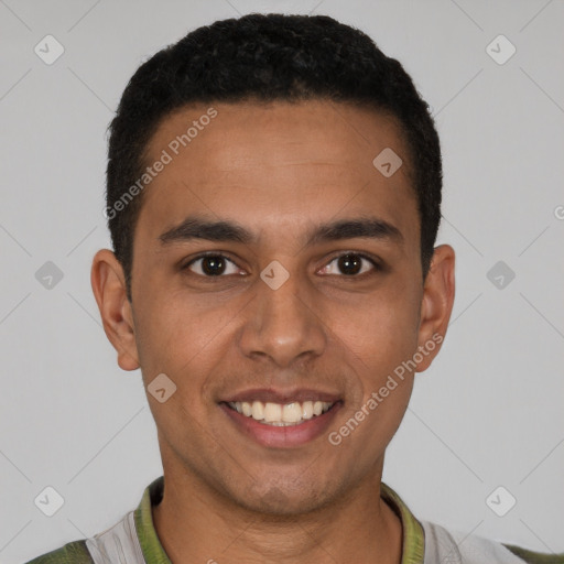 Joyful latino young-adult male with short  black hair and brown eyes