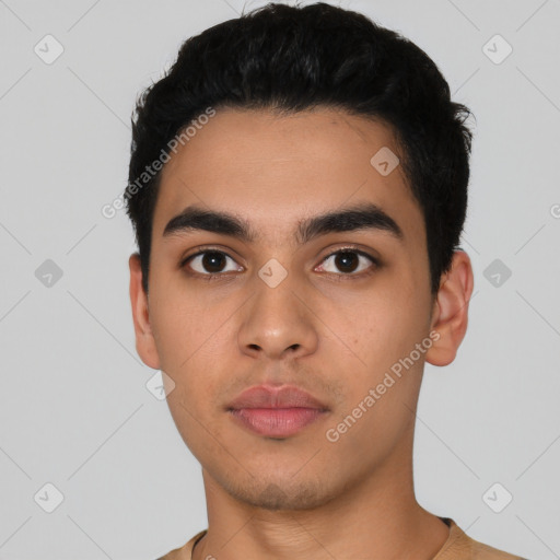 Neutral latino young-adult male with short  black hair and brown eyes