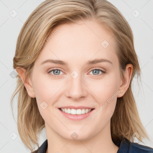 Joyful white young-adult female with medium  brown hair and blue eyes