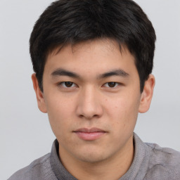 Neutral asian young-adult male with short  brown hair and brown eyes