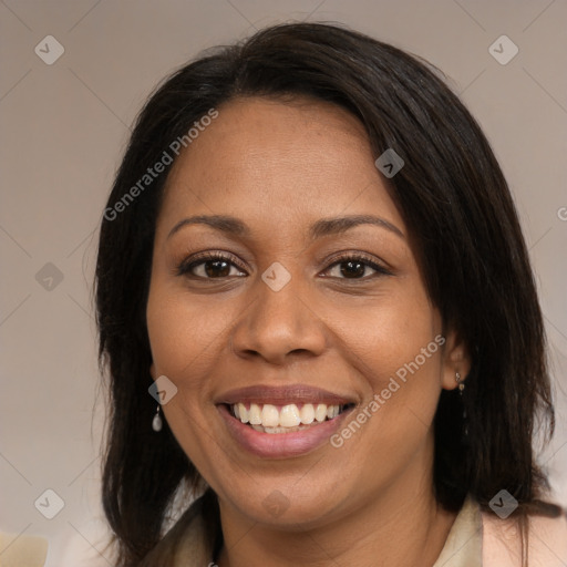 Joyful latino young-adult female with medium  brown hair and brown eyes
