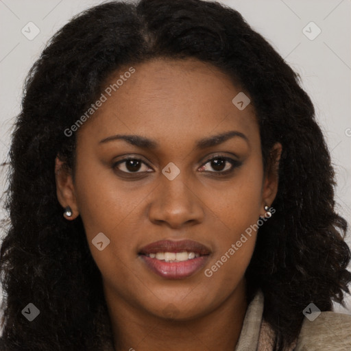 Joyful black young-adult female with long  brown hair and brown eyes