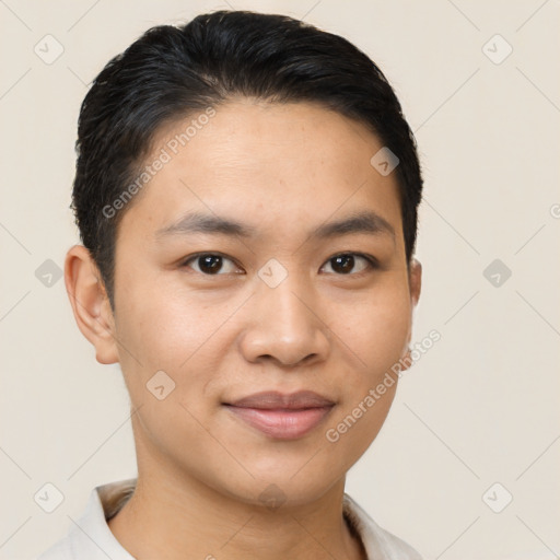 Joyful latino young-adult male with short  black hair and brown eyes