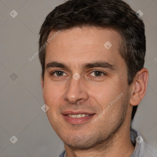 Joyful white adult male with short  brown hair and brown eyes