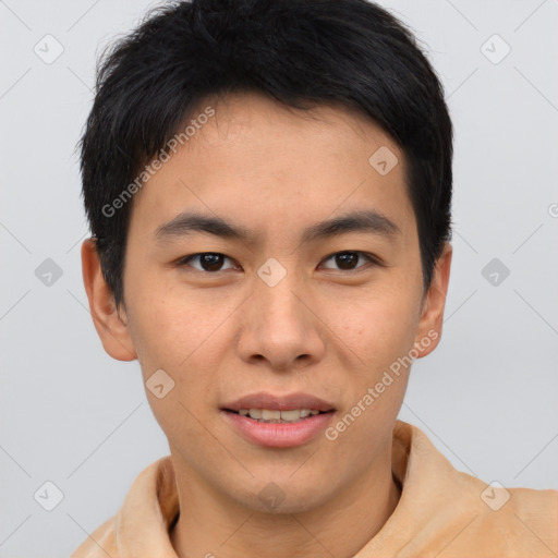 Joyful asian young-adult male with short  brown hair and brown eyes