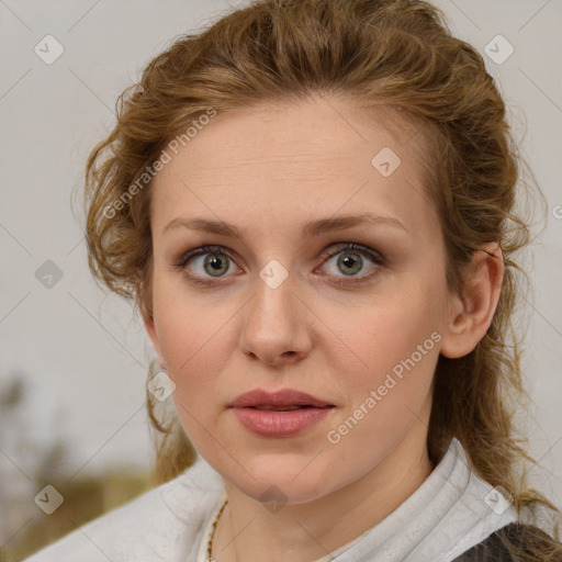 Joyful white young-adult female with medium  brown hair and blue eyes