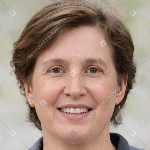 Joyful white adult female with medium  brown hair and grey eyes