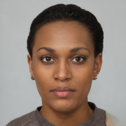 Neutral black young-adult female with short  black hair and brown eyes