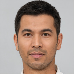 Neutral asian young-adult male with short  black hair and brown eyes