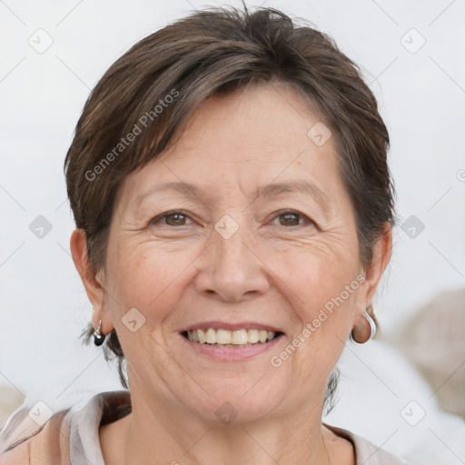 Joyful white adult female with short  brown hair and brown eyes