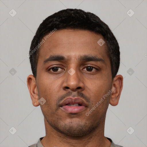 Neutral latino young-adult male with short  black hair and brown eyes