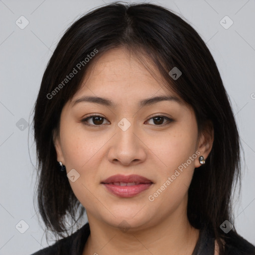 Joyful asian young-adult female with medium  brown hair and brown eyes