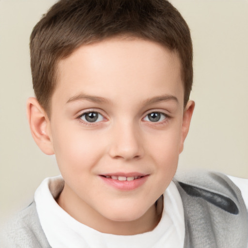 Joyful white child male with short  brown hair and brown eyes