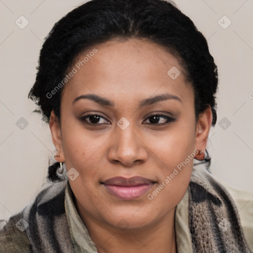 Joyful latino young-adult female with short  black hair and brown eyes