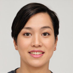 Joyful asian young-adult female with short  black hair and brown eyes