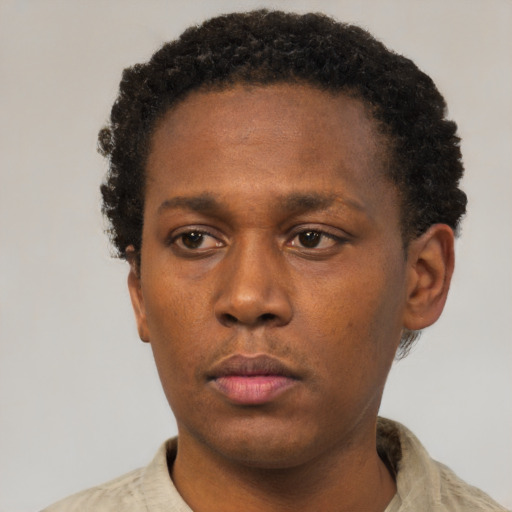 Neutral latino young-adult male with short  brown hair and brown eyes
