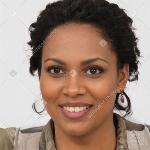 Joyful black young-adult female with medium  brown hair and brown eyes