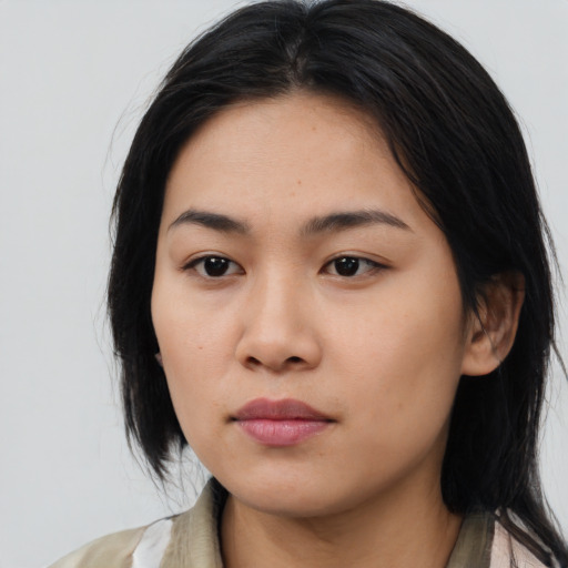 Neutral asian young-adult female with medium  black hair and brown eyes