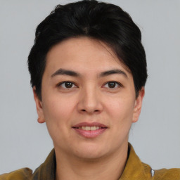 Joyful asian young-adult female with short  brown hair and brown eyes