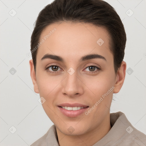 Joyful white young-adult female with short  brown hair and brown eyes