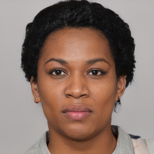 Neutral black young-adult female with short  black hair and brown eyes