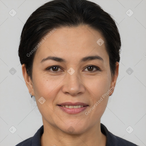 Joyful white adult female with short  brown hair and brown eyes