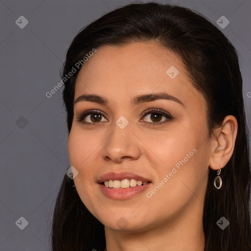 Joyful white young-adult female with long  brown hair and brown eyes