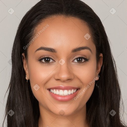 Joyful latino young-adult female with long  brown hair and brown eyes