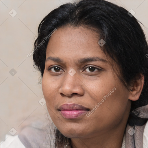 Joyful white adult female with medium  brown hair and brown eyes