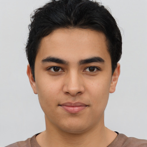 Neutral latino young-adult male with short  brown hair and brown eyes