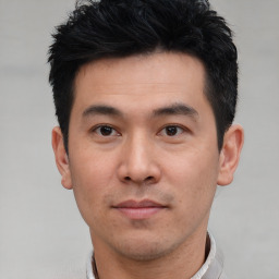 Neutral asian young-adult male with short  black hair and brown eyes