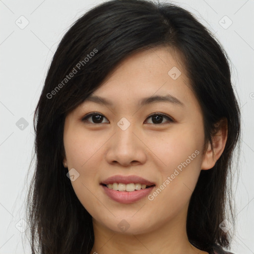 Joyful asian young-adult female with long  brown hair and brown eyes