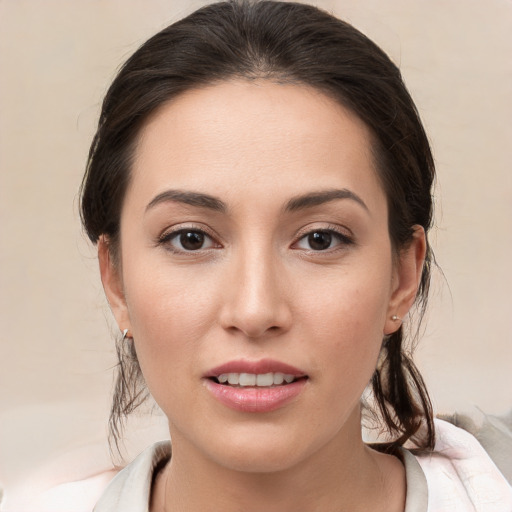 Joyful white young-adult female with medium  brown hair and brown eyes