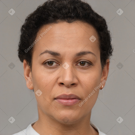 Joyful black adult female with short  brown hair and brown eyes