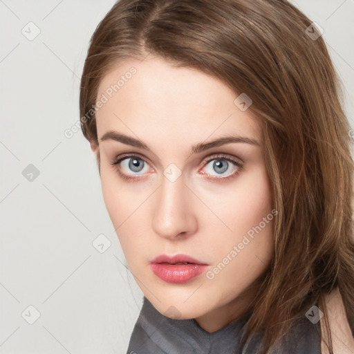 Neutral white young-adult female with long  brown hair and grey eyes