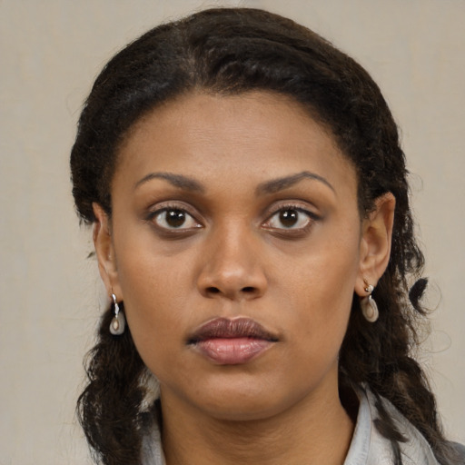 Neutral black young-adult female with medium  black hair and brown eyes