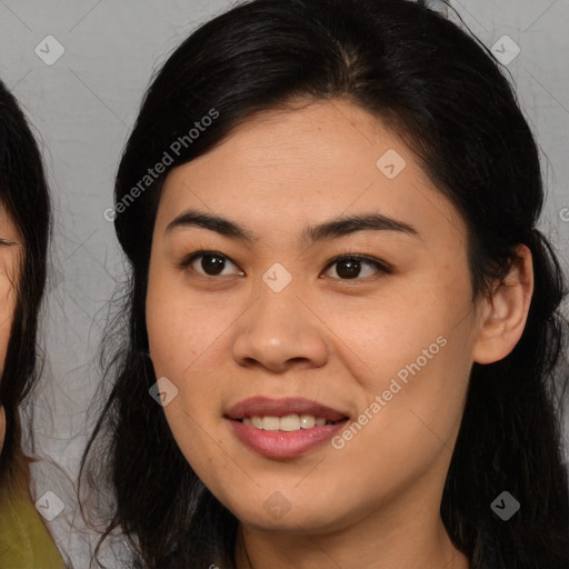 Joyful latino young-adult female with long  brown hair and brown eyes