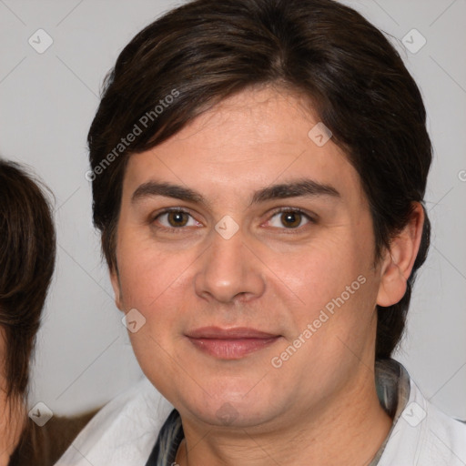 Joyful white adult male with medium  brown hair and brown eyes