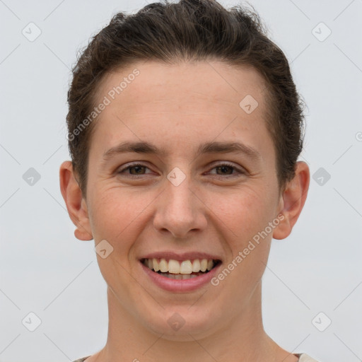 Joyful white young-adult female with short  brown hair and grey eyes