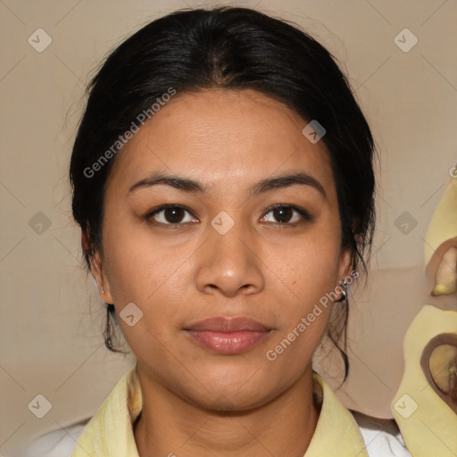 Joyful latino young-adult female with medium  brown hair and brown eyes