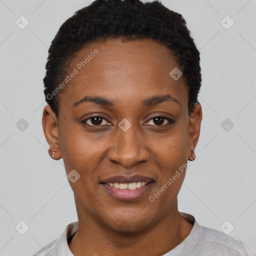 Joyful black young-adult female with short  black hair and brown eyes