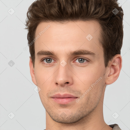 Neutral white young-adult male with short  brown hair and brown eyes