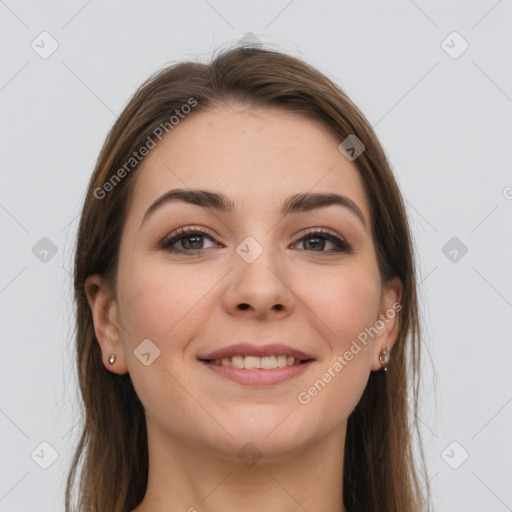 Joyful white young-adult female with long  brown hair and grey eyes