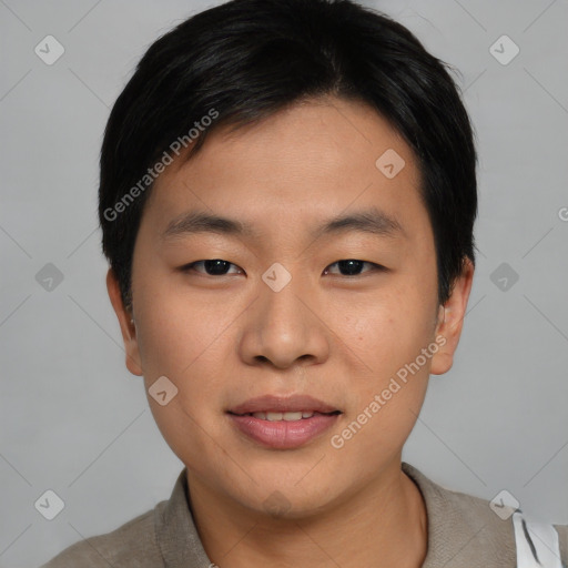 Joyful asian young-adult male with short  black hair and brown eyes